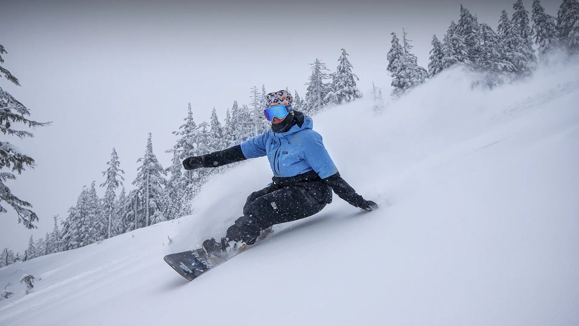 Ashley Thorton making a powder turn at Mt. Bachelor