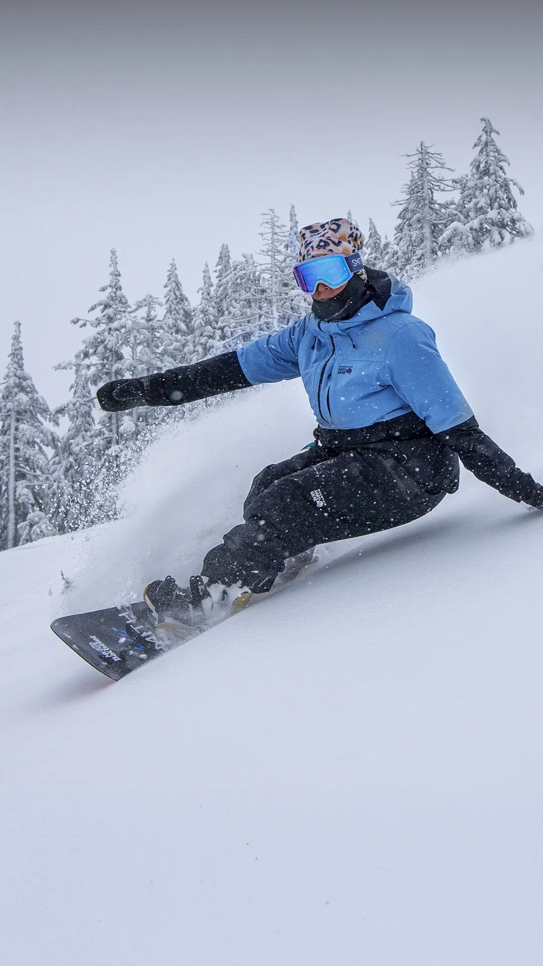Ashley Thorton making a powder turn at Mt. Bachelor